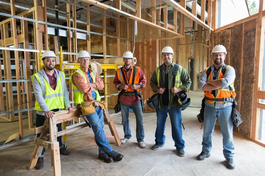 Construction workers together on a building site